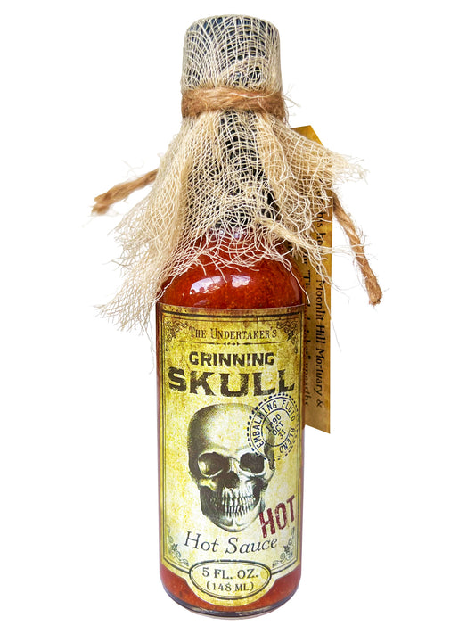 Grinning Skull Hot Sauce Bottle